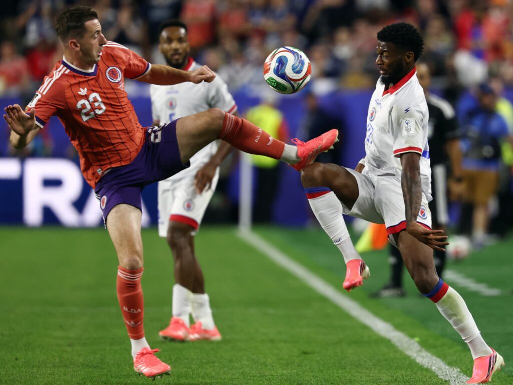 Kenny-McLean-et-Josue-Casimir-lors-du-match-entre-l-Ecosse-et-Haiti-a-la-Coupe-du-monde-le-14-06-2026-2303279